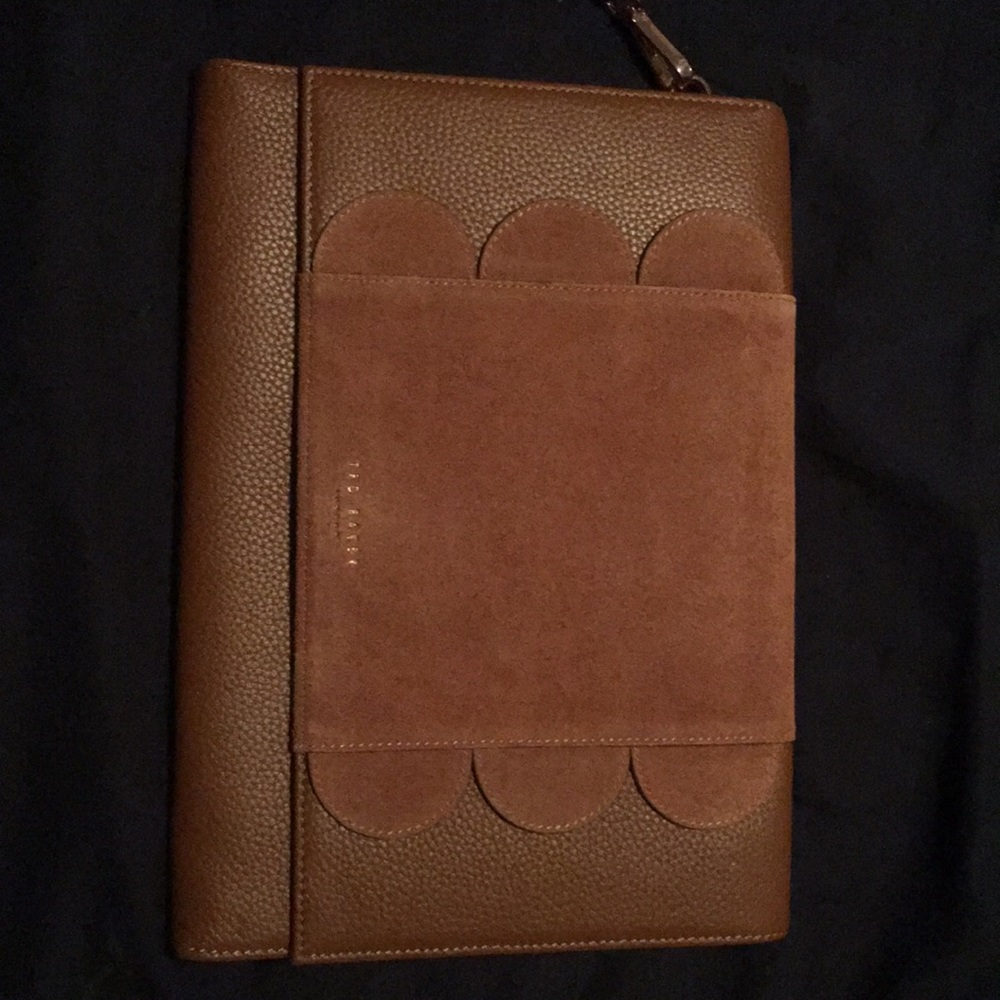 Brown leather Ted Baker London clutch purse.